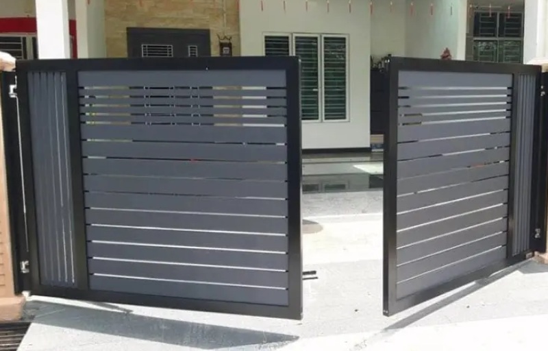 Traditional electric swing gate for entry into a residence.